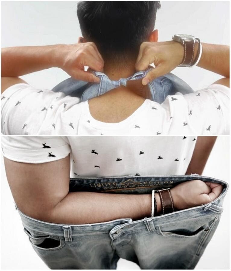 Homme qui teste la largeur de la taille d'un jean