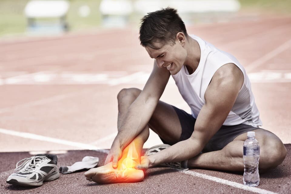 homme foulure sport 