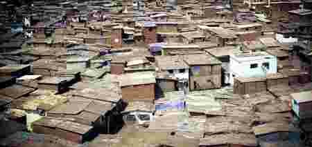 Voyage tourismes autochtones exaspération Inde photographier bidonvilles